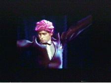 Rubberman accepts the Nobel prize