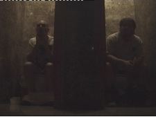 Two Superheroes Taking a Crap