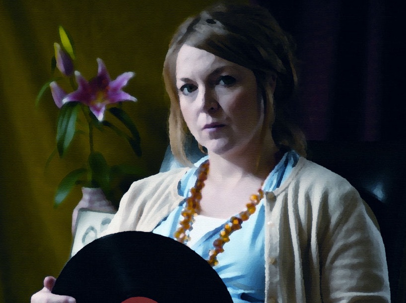 Kvinna vid grammofon