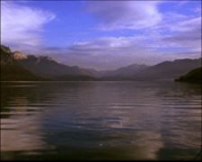 Femme au bord de la fenêtre