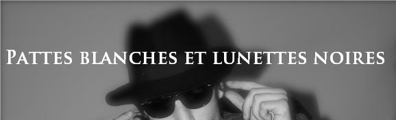 Pattes blanches et lunettes noires
