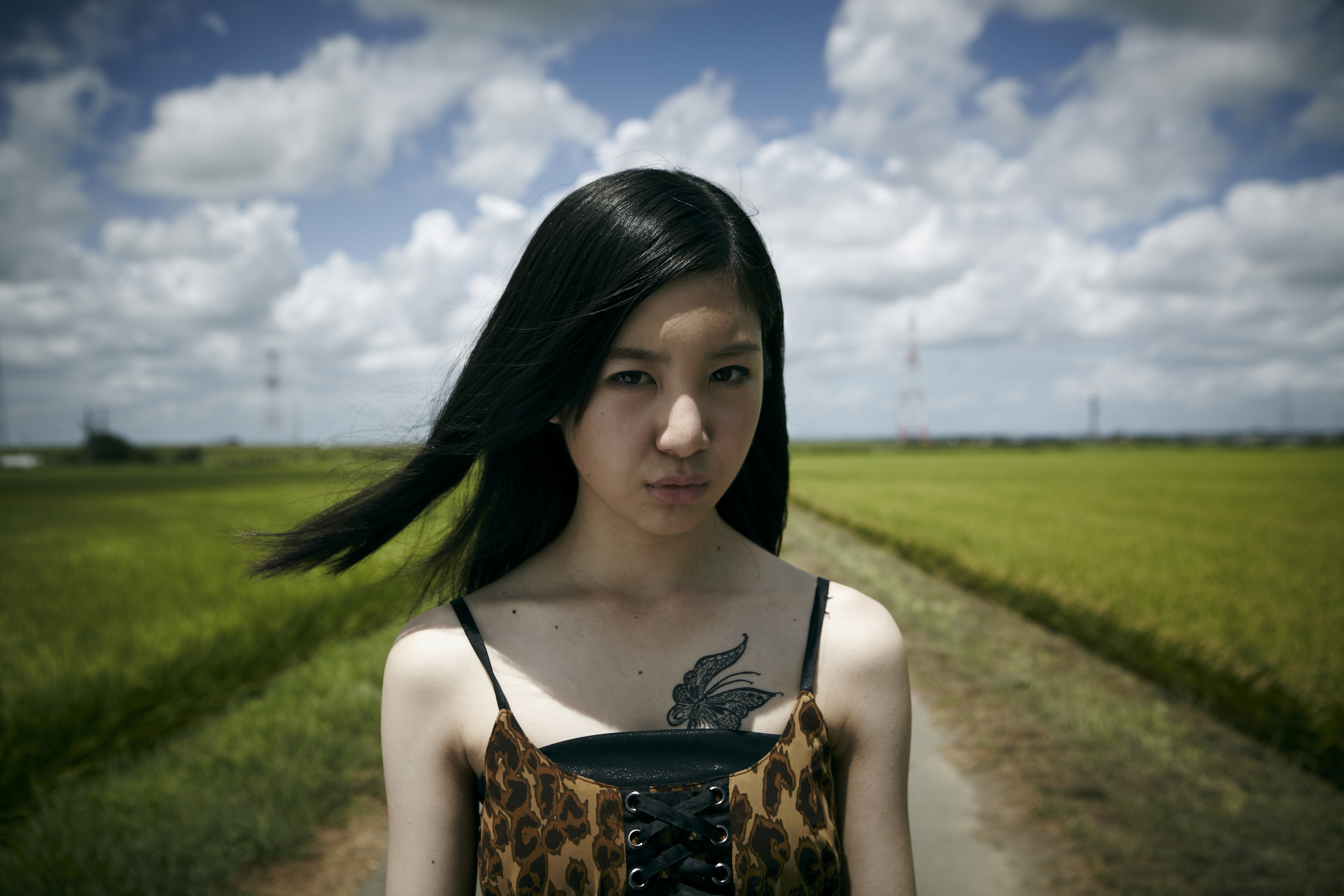A Butterfly on Her Chest
