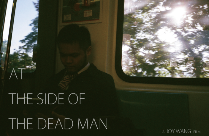 At the side of the dead man