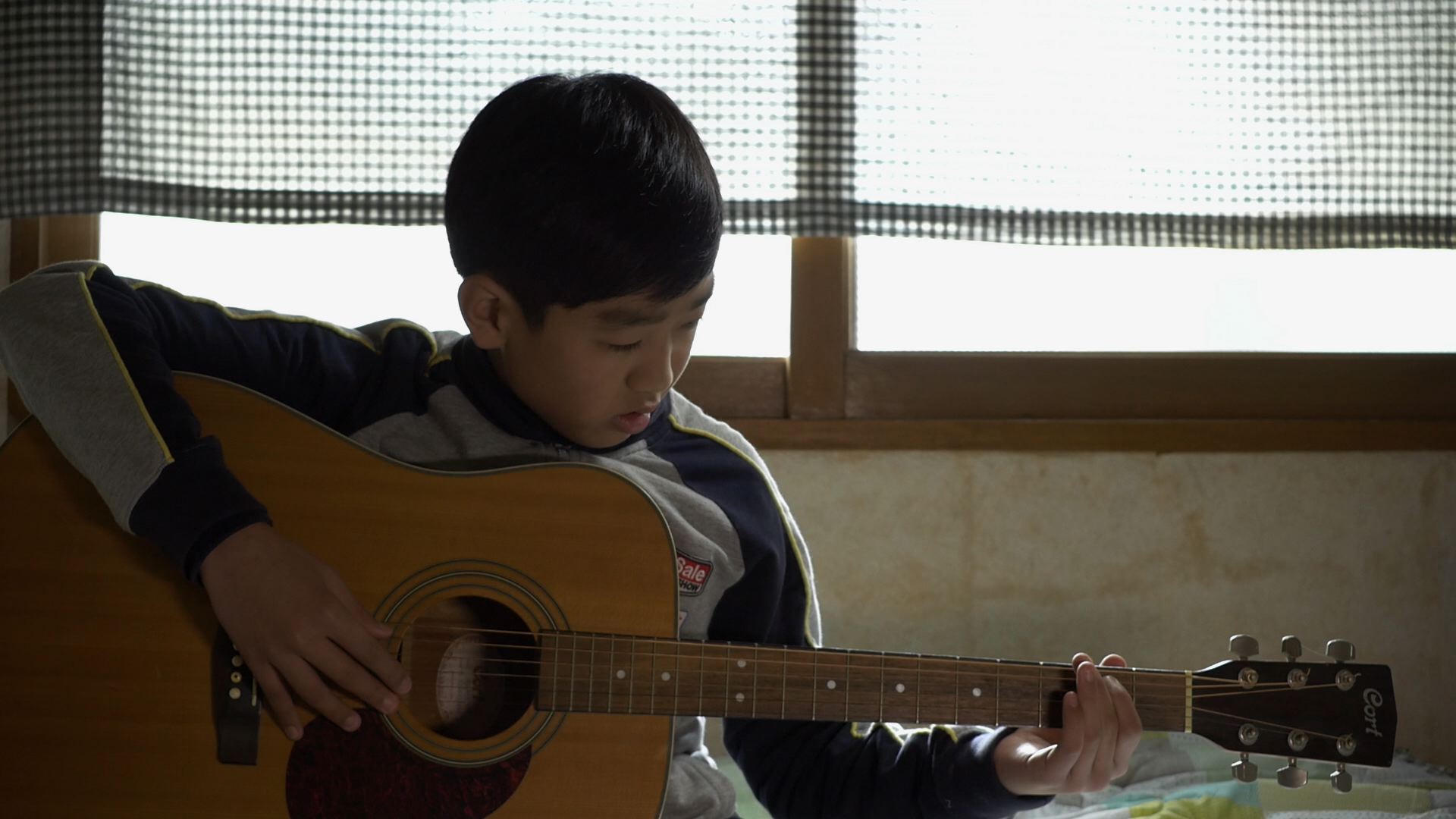 Boy with Guitar